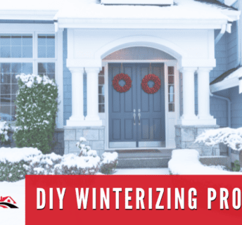 DIY Winterizing Projects text over a snow covered entrance to a home. The home has two blue doors with red wreaths, and snow covered shrubs.