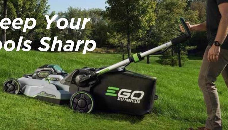 EGO lawnmower mower the grass on a hill. Keep lawnmower blades sharp with Ace blade sharpening services
